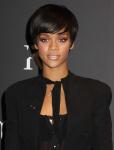 Rihanna 'Very Close' with Chris Brown, Calls Jay-Z Romance Rumors 'Crazy'