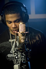 Chris Brown's, Nelly's and Queen Latifah's Olympic Track Videos