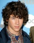 Nick Jonas Spends 16th Birthday Strolling Around Neighborhood and Walking Puppy