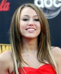 Miley Cyrus Struggles to Stay Normal, Compares Herself to Bolt