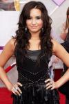 Demi Lovato Praises Miley Cyrus for Helping Her Coping With Fame
