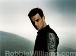 Robbie Williams Is Special Honoree at 2010 BRIT Awards