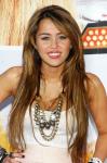 Miley Cyrus Says 'New Moon' Is Cult, Johnny Depp Hotter Than Robert Pattinson