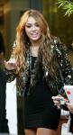 Video: Miley Cyrus Kisses Female Dancer on 'Britain's Got Talent' Performance