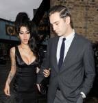Amy Winehouse Back to Reg Traviss' Arms