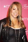 Mariah Carey Pushed Around in Wheelchair Following Singapore Fall