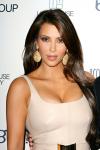 Kim Kardashian Posts Her 'Most Risque Cover' With Two Naked Men
