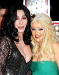 Christina Aguilera and Cher Sign 'Burlesque' Poster for Charity