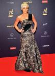 Pink Allegedly Shows Off Bulging Belly on Beach