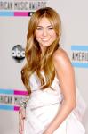Miley Cyrus Talks to Lawyers Over Fake Nude Picture