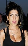Amy Winehouse Hospitalized for Catching Virus