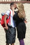 Kirstie Alley Gives Romeo Big Kiss on Lips