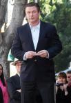 Alec Baldwin Prepares Thigh Master for Hurricane Irene