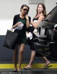 Slipped Disc Forces Victoria Beckham to Trade Heels With Flat Shoes