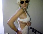 Lindsay Lohan Gets Billy Joel's 'Extremes' Tattoo on Ribcage