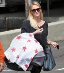 Charlize Theron Brings Along Baby Jackson on Post Office Trip