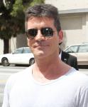 Book Said Simon Cowell Had Affair With Dannii Minogue and Lusted Cheryl Cole
