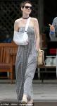 Anne Hathaway All Smiles While Out and About Wearing a Sling on Her Arm