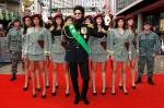 Sacha Baron Cohen Aims Gun, Gets Surrounded by Sexy Ladies at 'Dictator' U.K. Premiere