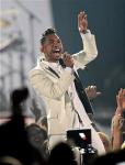 Miguel Apologizes for Landing on Female Fan's Head at Billboard Music Awards