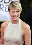 Robin Wright Flashes Breast Tape While Receiving Golden Globe Award