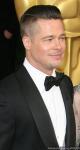 Brad Pitt Says He 'Cleaned Dog Poop' Before the Oscars