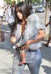 North West Photographed Walking With Kim Kardashian During an Outing