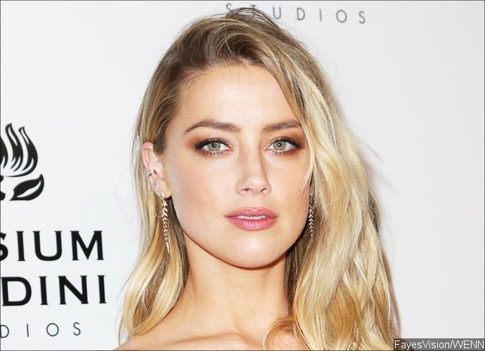 Amber Heard Steps Out in Unzipped Pants - New Fashion Trend?
