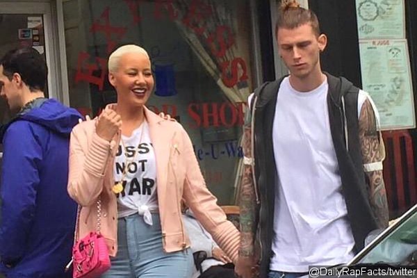 Amber Rose and Machine Gun Kelly Get Cozy at LAX, Spark Dating Rumors