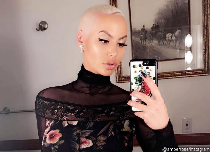 Amber Rose Considering a Breast Reduction: 'My Boobs Are Stupid Heavy'