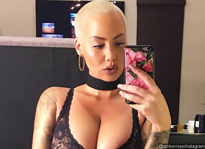 Amber Rose Flaunts Ample Cleavage in Body-Baring Jumpsuit. See the Pic!