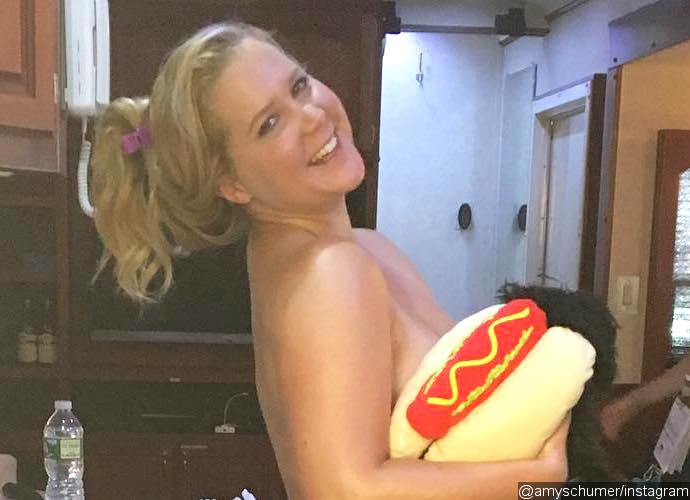 Amy Shcumer Poses Topless With Her Cute Puppy in New Instagram Photo
