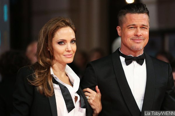 Report: Angelina Jolie and Brad Pitt Adopting Child From Syria