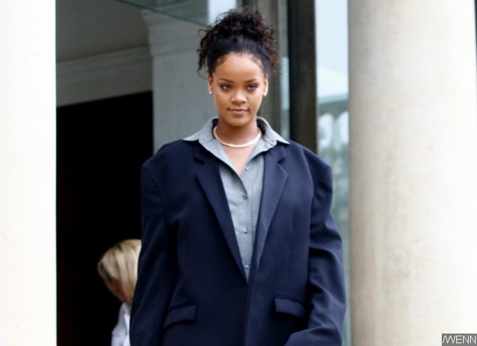 Braless Rihanna Debuts Turquoise Hair in Barbados