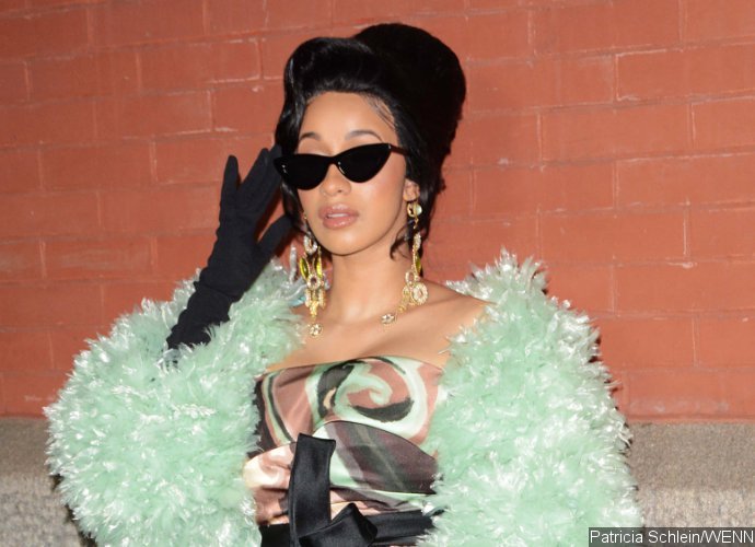 Cardi B Covers Midsection at NYFW Amid Pregnancy Rumors