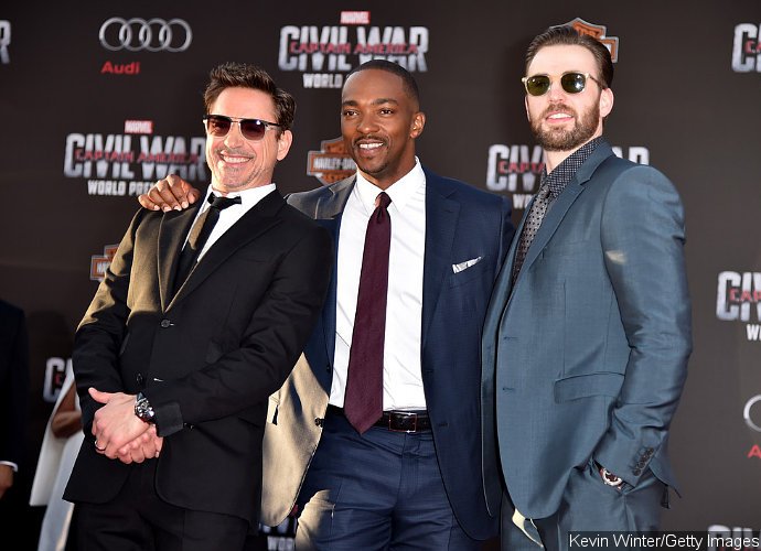 Chris Evans, Robert Downey Jr. Put Aside On-Screen Rivalry for 'Captain America: Civil War' Premiere