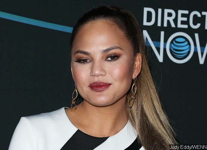 Chrissy Teigen Suffers Nipple Slip at Super Bowl. Find Out Her Reaction