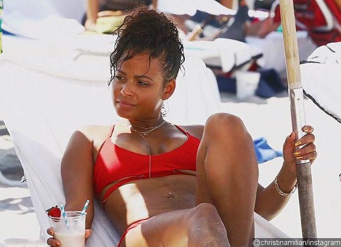 Christina Milian Flashes Major Underboob In Daring Red Bikini