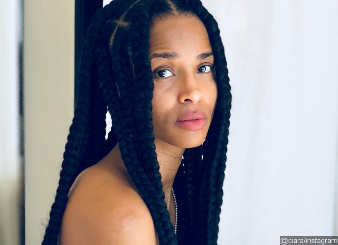 Ciara Flashes Nipple as She Poses Half-Naked in Bed