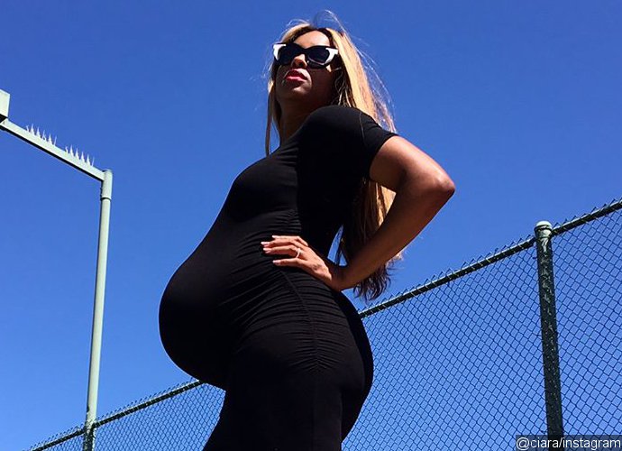Heavily Pregnant Ciara Flaunts Baby Bump in Tight Black Dress