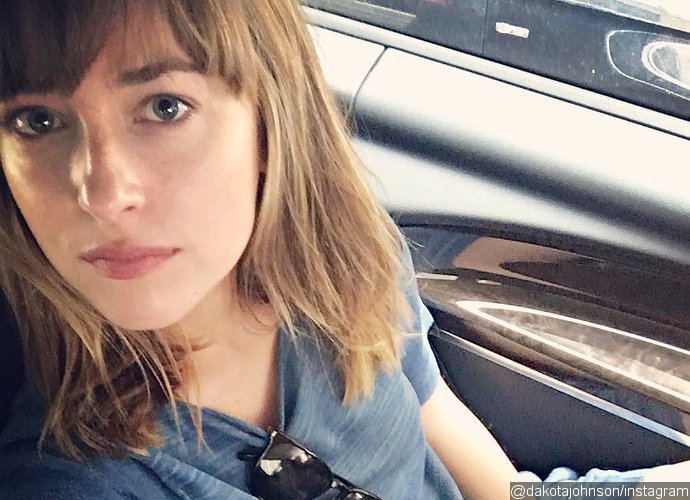 Dakota Johnson Channels 'Fifty Shades' Character in This Provocative Photo