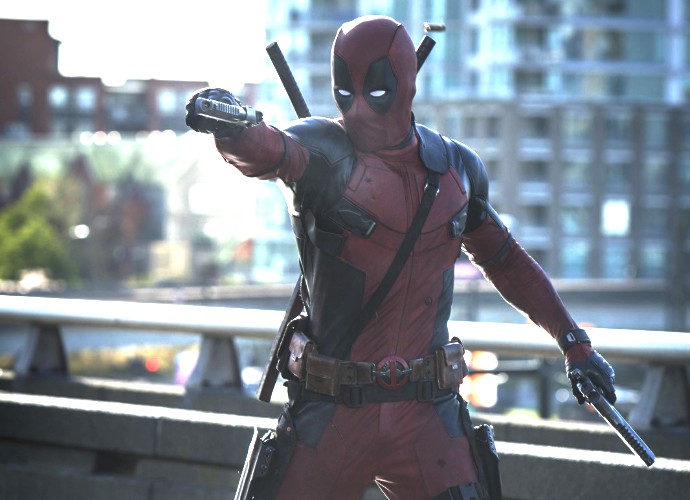 Deadpool Is Dangling in Front of a Billboard in New Set Photos of Sequel
