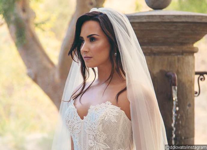 Demi Lovato Sends Fans Into a Frenzy With a Photo of Herself in a Wedding Gown