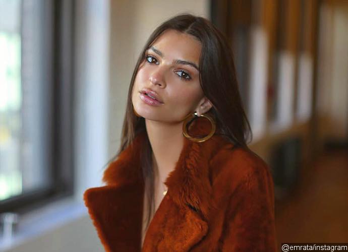 Emily Ratajkowski Goes Provocative in Topless Bed Picture