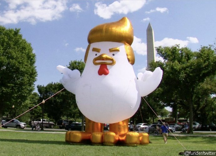 giant inflatable donald trump like chicken spotted next to chicken chart