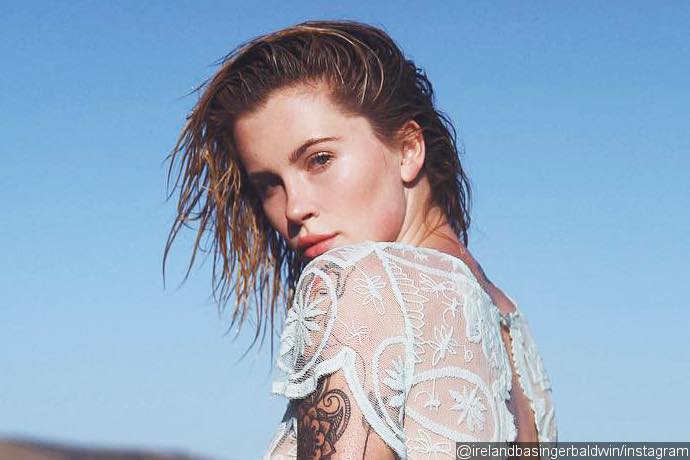 Ireland Baldwin Flashes Her Boob and Derriere in Sheer Lace Dress