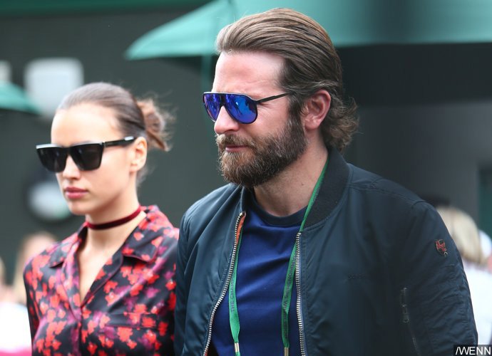 Irina Shayk Is Pregnant With Bradley Cooper's Child, Debuts Bump at VS Show