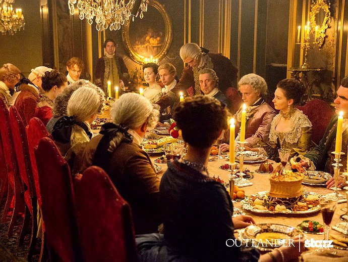 Jamie and Claire Host a Feast in New 'Outlander' Season 2 Photos