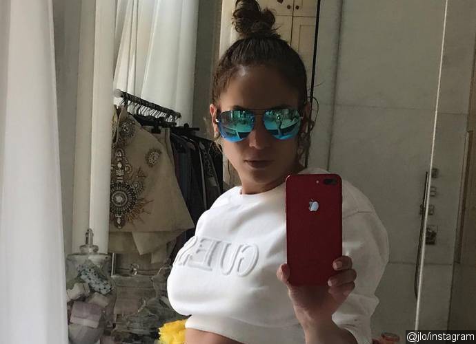 Jennifer Lopez Claps Back at Haters for Accusing Her of Photoshopping Her Abs