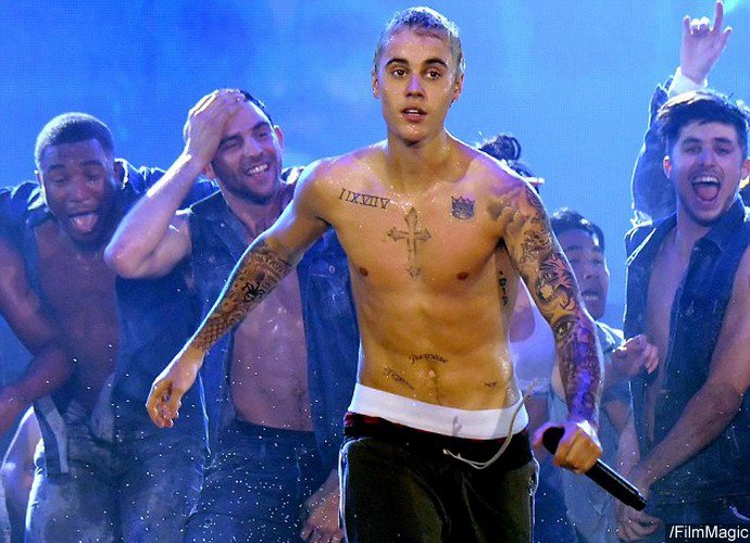 Justin Bieber Goes Wet and Shirtless During His Purpose World Tour in Seattle